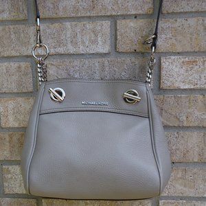 Michael Kors gray pebbled leather crossbody bag.